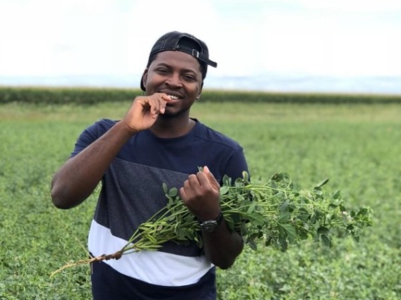SBAR student – Meshack Audu – in a guar research field at the NMSU Agricultural Science Center in Clovis, New Mexico