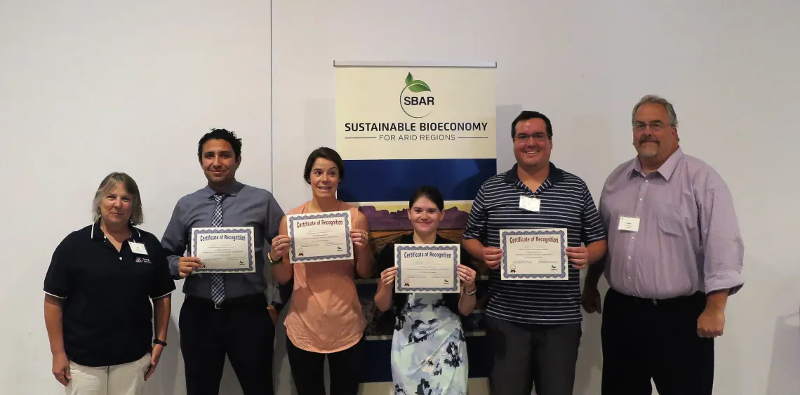 Student Poster Contest Winners with Dr. Kim Ogden, SBAR PI, and Mr. Steve Csonka, SBAR Advisory Board Member. Student Poster Contest Winners with Dr. Kim Ogden, SBAR PI, and Mr. Steve Csonka, SBAR Advisory Board Member.